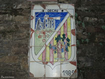 Escut d´Orcau en una paret del poble
